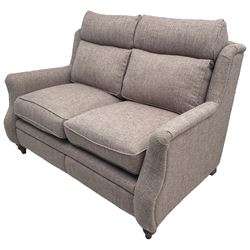 Parker knoll -  'Newbury' two-seat sofa (W148xm, H103cm, D100cm); and matching armchair with electric rising footrest (W85cm); upholstered in lavender fabric 