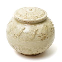 Chinese celadon glazed jar, possibly Ming dynasty, with moulded repeating decoration, 9.5cm