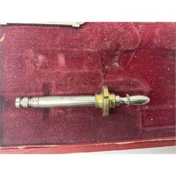 A 19th century French pivoting tool in its original box.