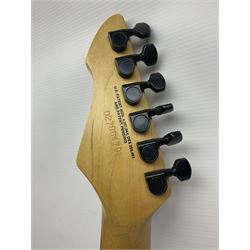 American Peavey Nitro 1 hand-made electric guitar in red with Kahler tremolo, serial no.02786479, L98cm overall; in soft carrying case.