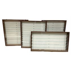 Four die-cast model wall mounting display cases by Picture Pride Displays Sandwell; each with mahogany stained frames and glazed fronts; three 83 x 75.5cm with eleven plate glass shelves and one 57 x 106cm with five plate glass shelves (4)