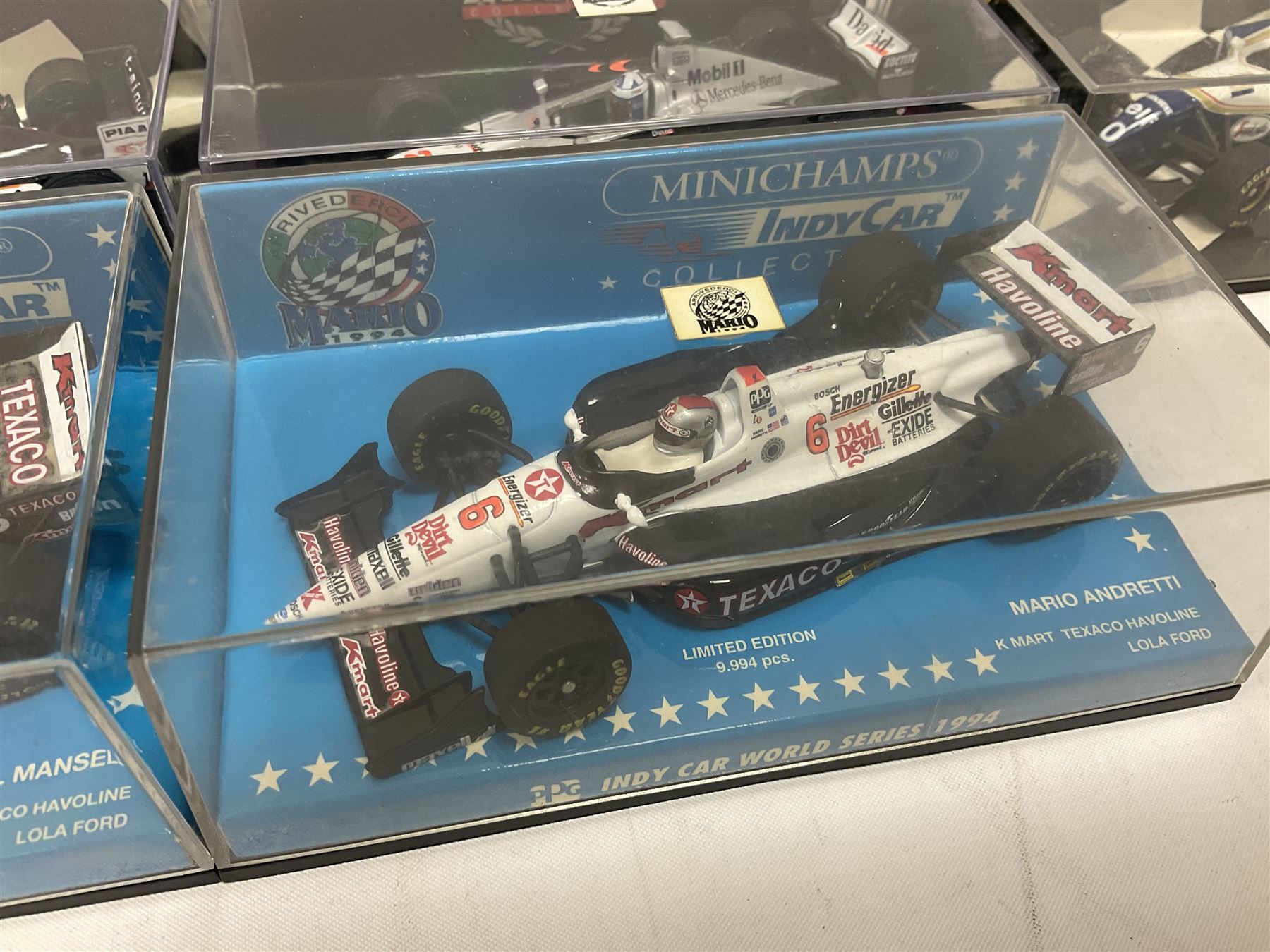 Pauls Model Art Minichamps Formula - ten 1:43 scale die-cast models of racing cars in plastic display cases (10)