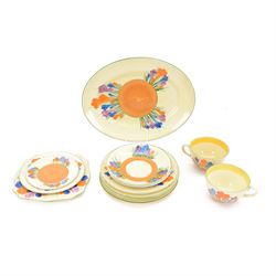 Clarice Cliff Crocus pattern dinner wares, including two teacups and saucers, five side pl...