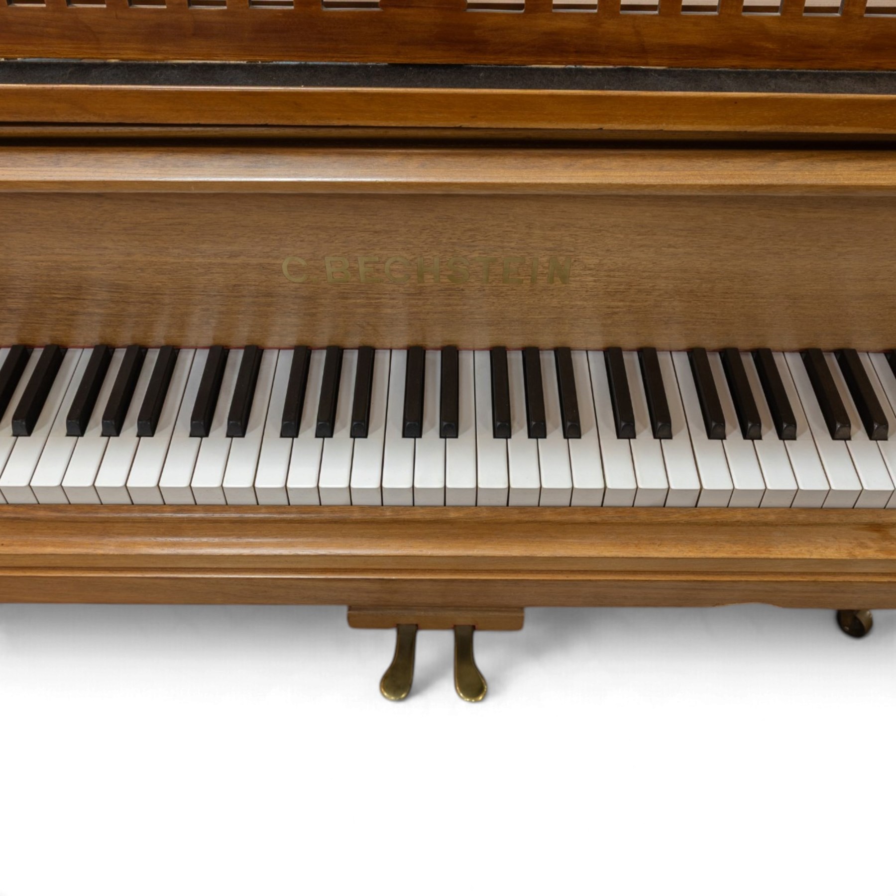 Edwardian C. Bechstein mahogany cased baby grand piano, serial no. 84403 circa 1907, retailed by 1066 Pianos Cambridge, raised on turned and faceted tapering supports terminating in brass castors, H100cm, L183cm
This item has been registered for sale under Section 10 of the APHA Ivory Act