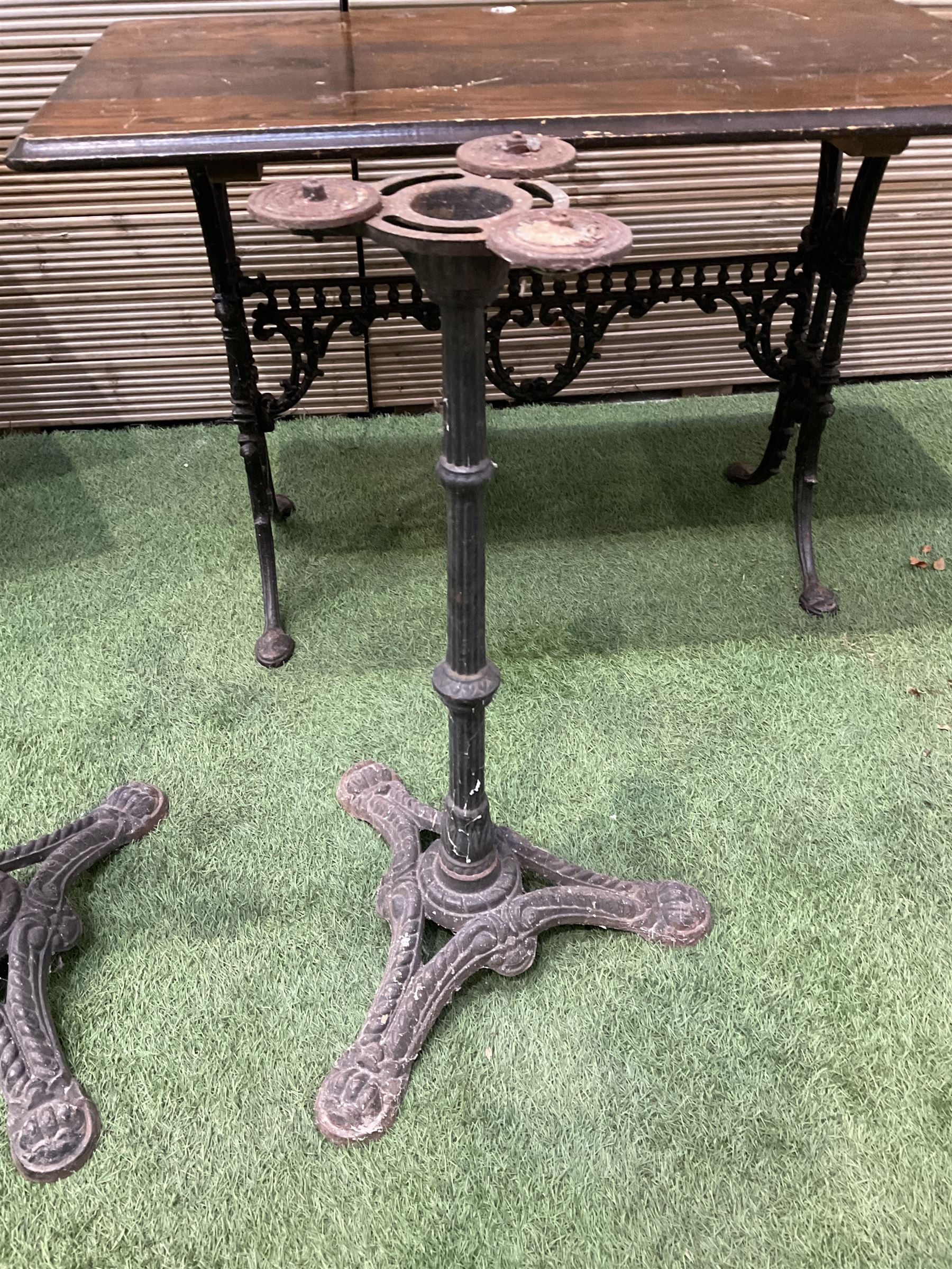 Britannia cast iron pub table, an ornate cast iron rectangular pub table, and three cast iron table bases (5) - THIS LOT IS TO BE COLLECTED BY APPOINTMENT FROM DUGGLEBY STORAGE, GREAT HILL, EASTFIELD, SCARBOROUGH, YO11 3TX