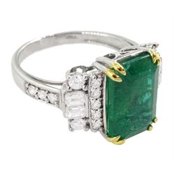 18ct white gold emerald cut emerald ring, each side set with round brilliant cut and baguette cut diamonds, with diamond set shoulders,  stamped 750, emerald 4.77 carat, with World Gemological Institute report