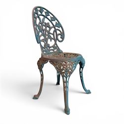Cast iron garden table and four chairs, in the Art Nouveau style, with pierced floral and foliate decoration throughout, circular table raised on four cabriole legs with stretcher ring, chairs with shaped openwork backs and seats, in a weathered green finish