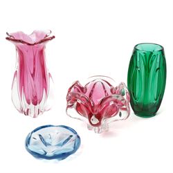 Four mid-century art glass examples, including a green 'Bullet Lens' vase designed by Rudo...