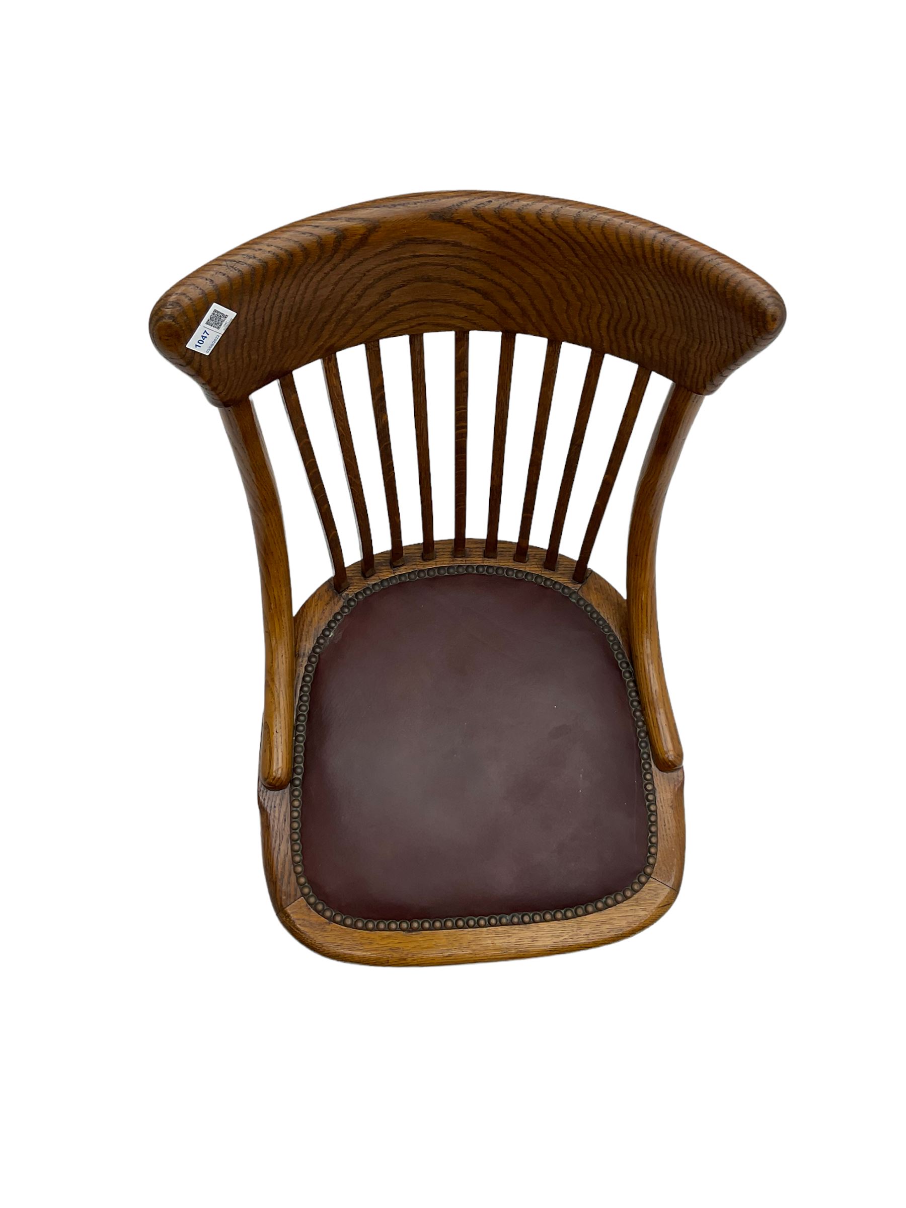 Early 20th century office oak adjustable swivel chair with studded leather seat