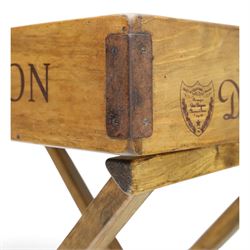 Champagne butler’s tray on stand, the wooden tray printed with champagne bottles and brand names, with cutout handles, raised on a folding stand