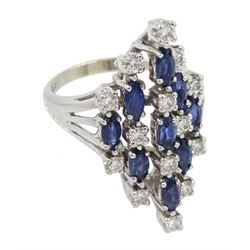 White gold diamond and sapphire ring, five graduating rows of round brilliant cut diamonds and oval sapphires in a stepped design setting, stamped 14K