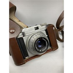 Ensign Ranger II folding roll film camera, Beirette Junior II camera and Bell & Howell 624 EE Autoset hand-wind cine camera, all in cases