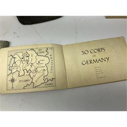 WW2 German War Pass (Wehrpass) identification paperwork for Walter Fensterseifer 2nd type booklet dated 8/6/1940, with signed photo of recipient in civilian suit. Born 31st January 1921. Numerous entries; together with quantity of small private photographs of German soldiers; One Million mark banknote 1923; 30th Corps in Germany booklet with Formation badge; and other WW2 paper ephemera