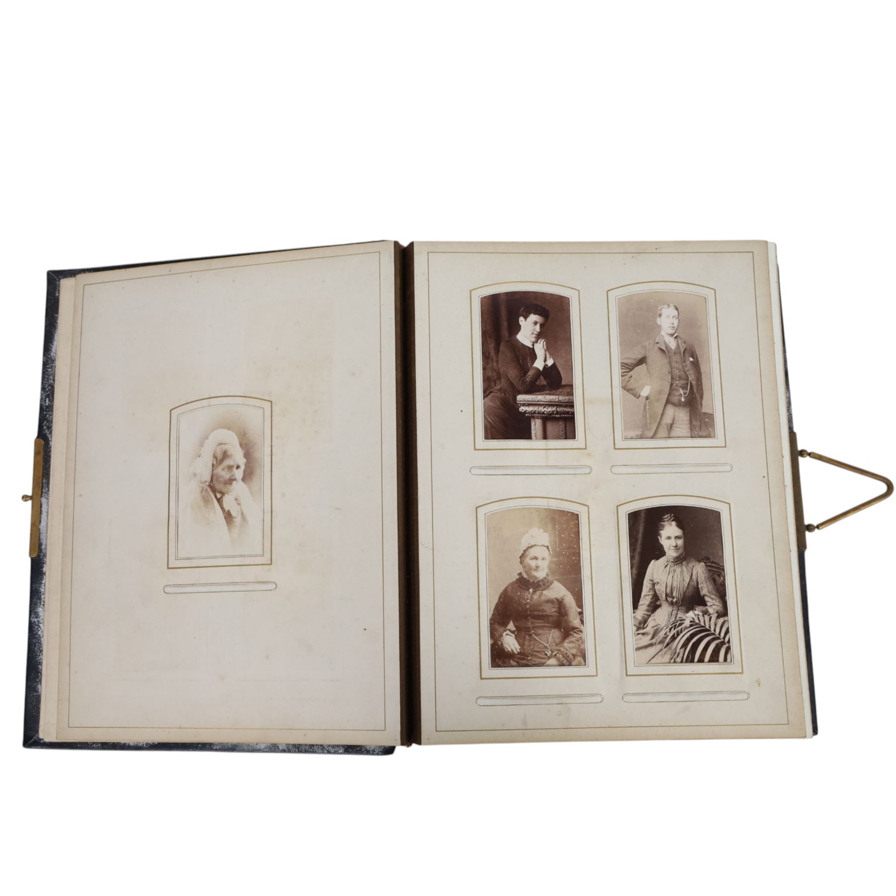 Two Victorian photograph albums, containing a collection of full and portrait Cartes de Visite, photographs and other ephemera