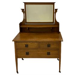 Early 20th century oak dressing chest, fitted with three drawers, swing mirror