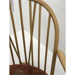 Ercol armchair with loose cushions, spindle back, turned supports