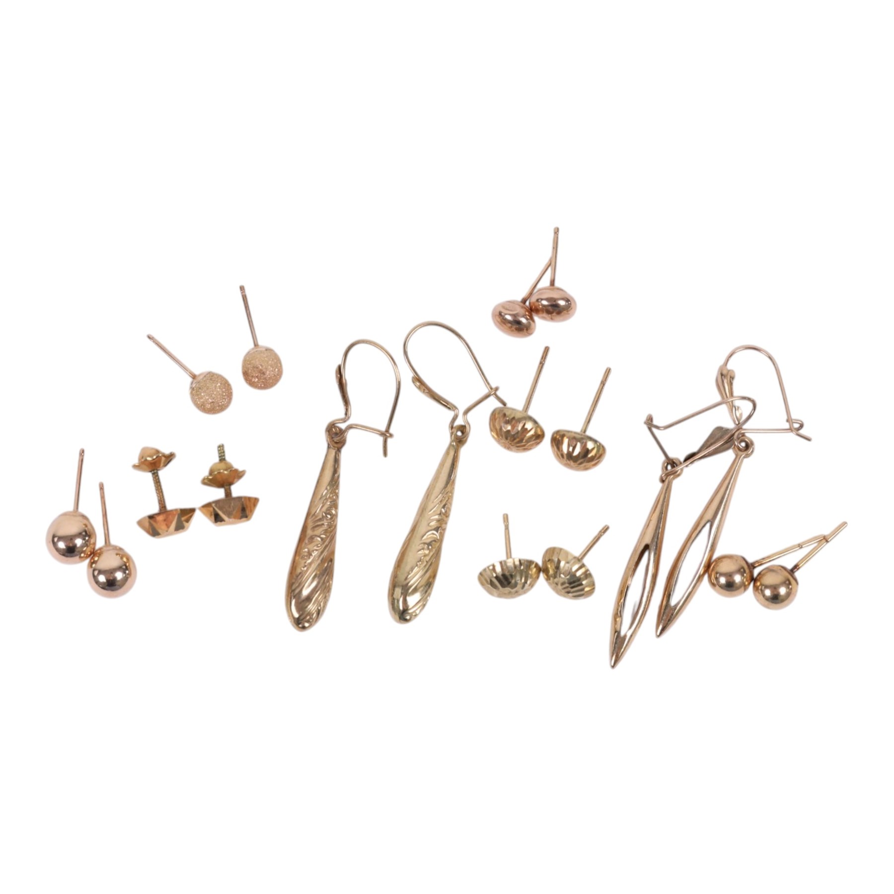 Eight pairs of 9ct gold earrings 