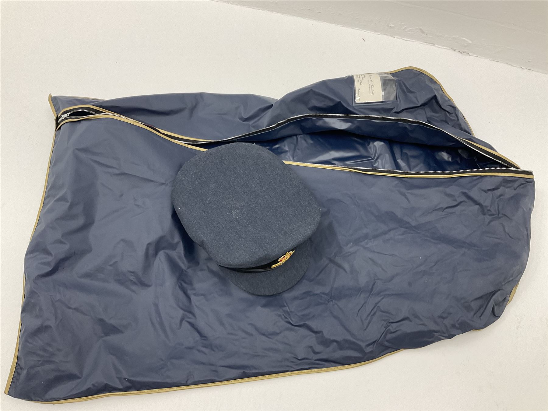 RAF Flight Lieutenant's uniform with peaked cap and WW2 ribbon bar; WW2 gas mask in blue canvas bag dated 1942; flying helmet date 1984; and British Army Major's uniform with Staybrite buttons and peaked cap