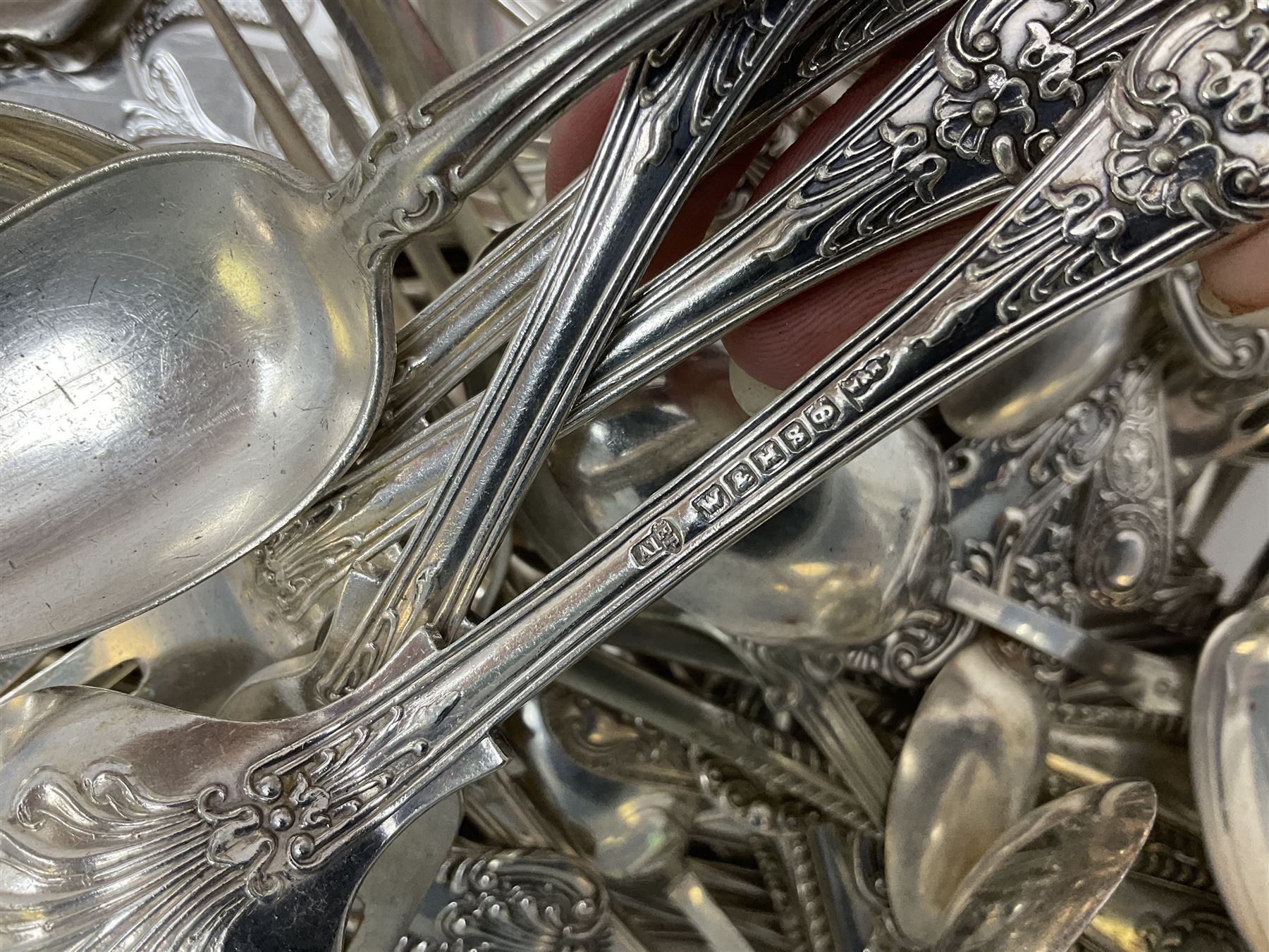 Quantity of assorted silver plated and other flatware, to include part sets, set of three silver plated cruets, glass sifter with silver plated cover, two glass decanters and stoppers, etc., in one box 