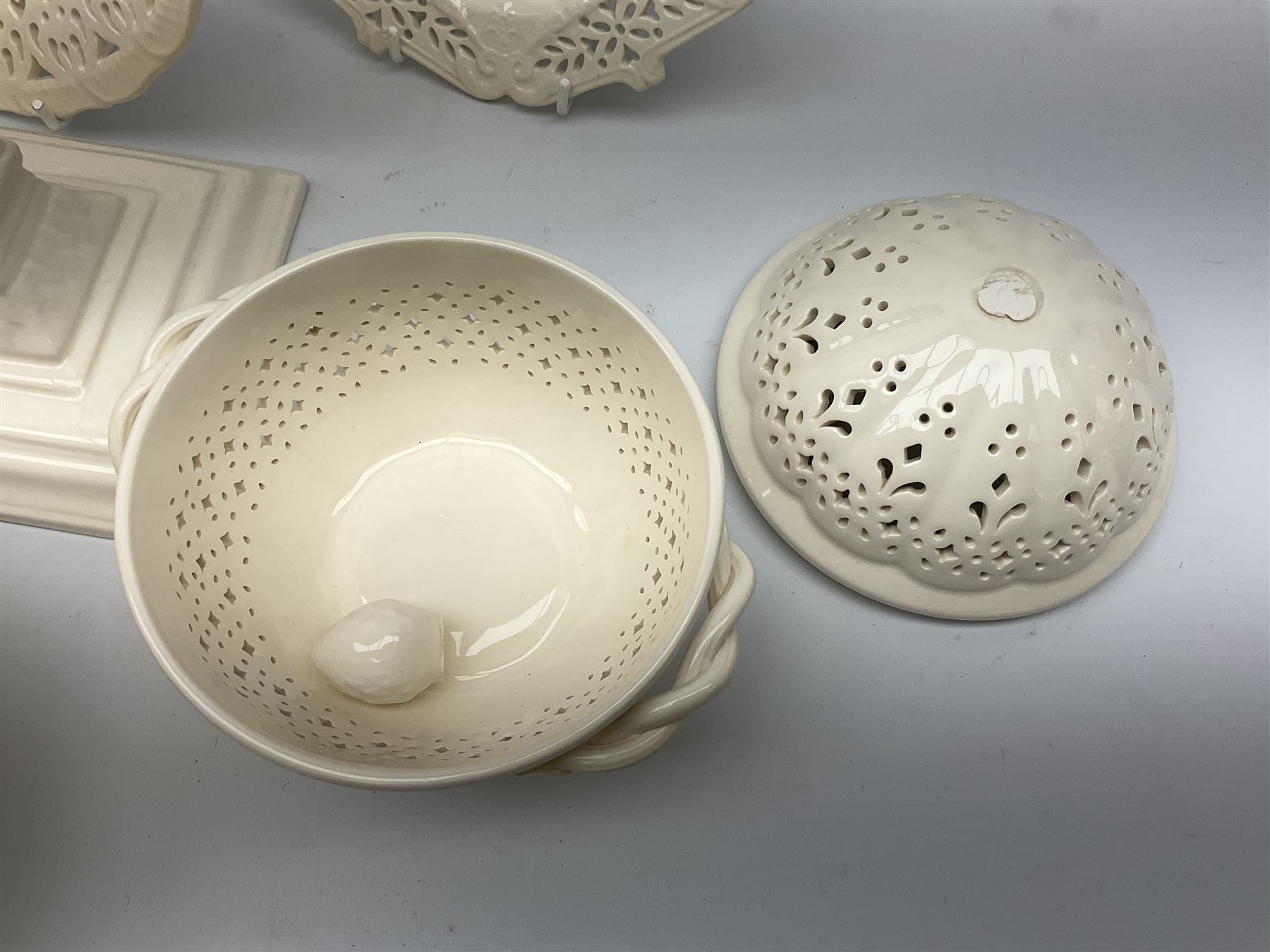 Collection of Harley Greens & co Leeds pottery creamware, including two candle sticks H14.5cm, two twin handled bowls, three plates, square tray and lidded bowl. 