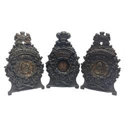 Two early 20th century cast-iron money banks - 'Our Kitchener Bank' c1914 H17cm and 'Our Empire Bank' c1911 depicting George V and Queen Mary H17cm; both by Sydenham & McCoustra; and another similar for The Prince & Princess of Wales 1981 by Robert Brown (3)