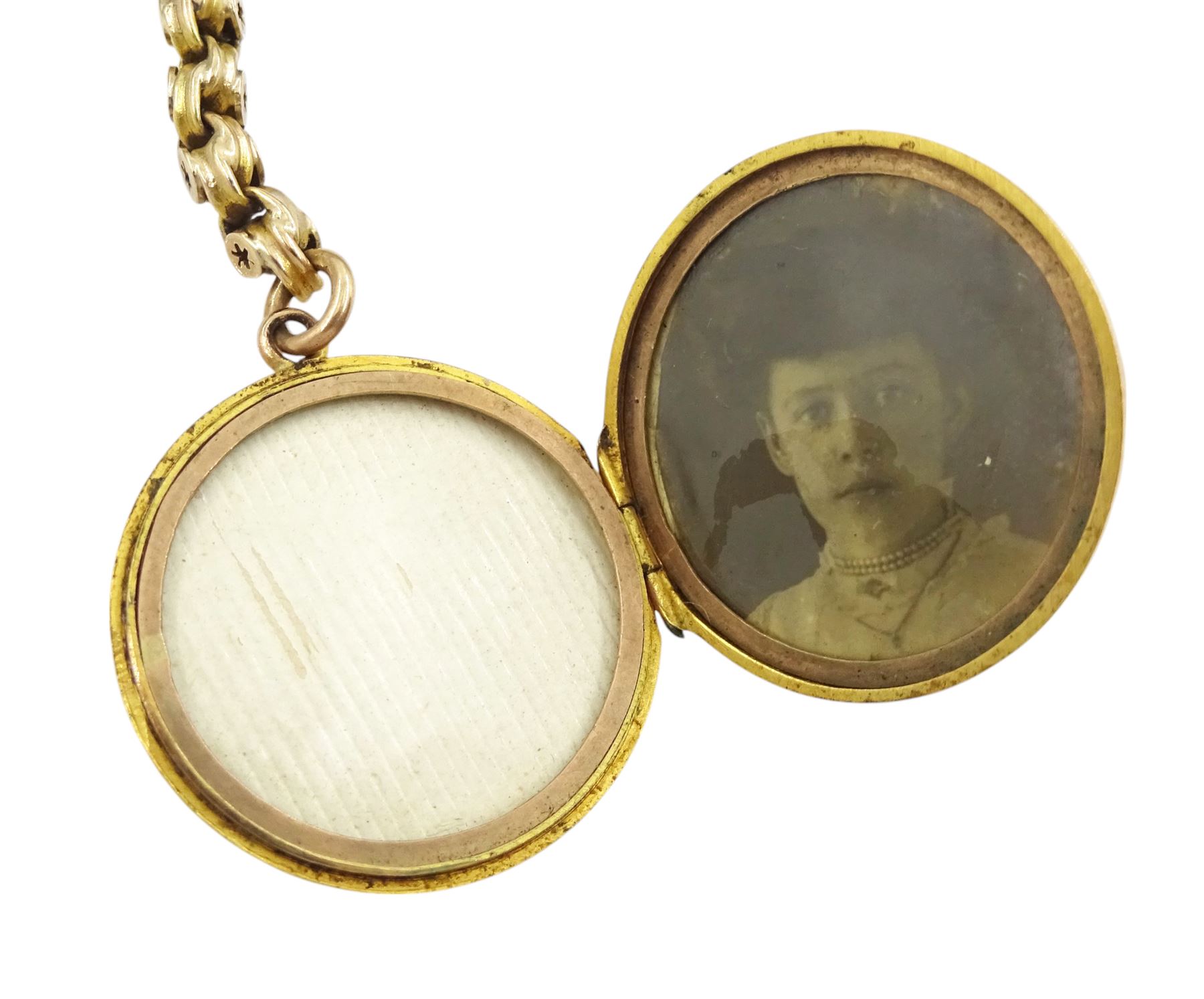 Early 20th century 10ct gold fancy link chain bracelet, with 9ct rose gold locket charm, with engraved bird decoration, Birmingham 1910