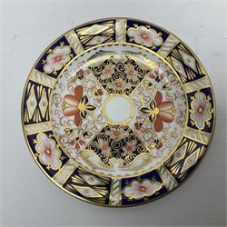 Royal Crown Derby imari pattern covered trinket box, together with three imari pattern 2451 plates of various sizes, largest plate D27cm 