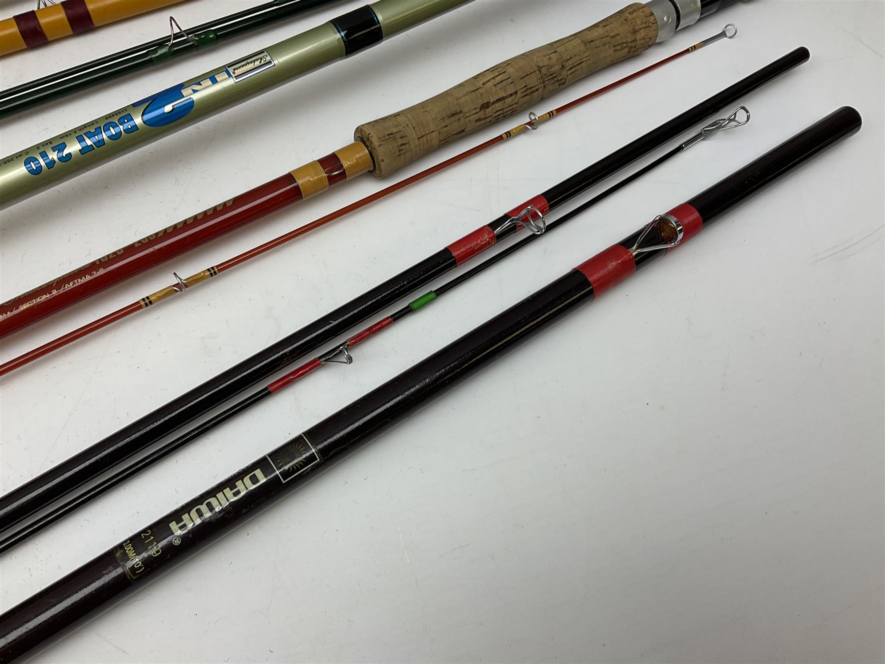 Quantity of fly and sea fishing rods and accessories, to include Shakespeare Boat 210 rod, Daiwa rod and others, and Guang Zhao FLD9000 course fishing reel, Beachmaster 7000FD, Rimfly II amd Penn Super Mariner, tackle etc