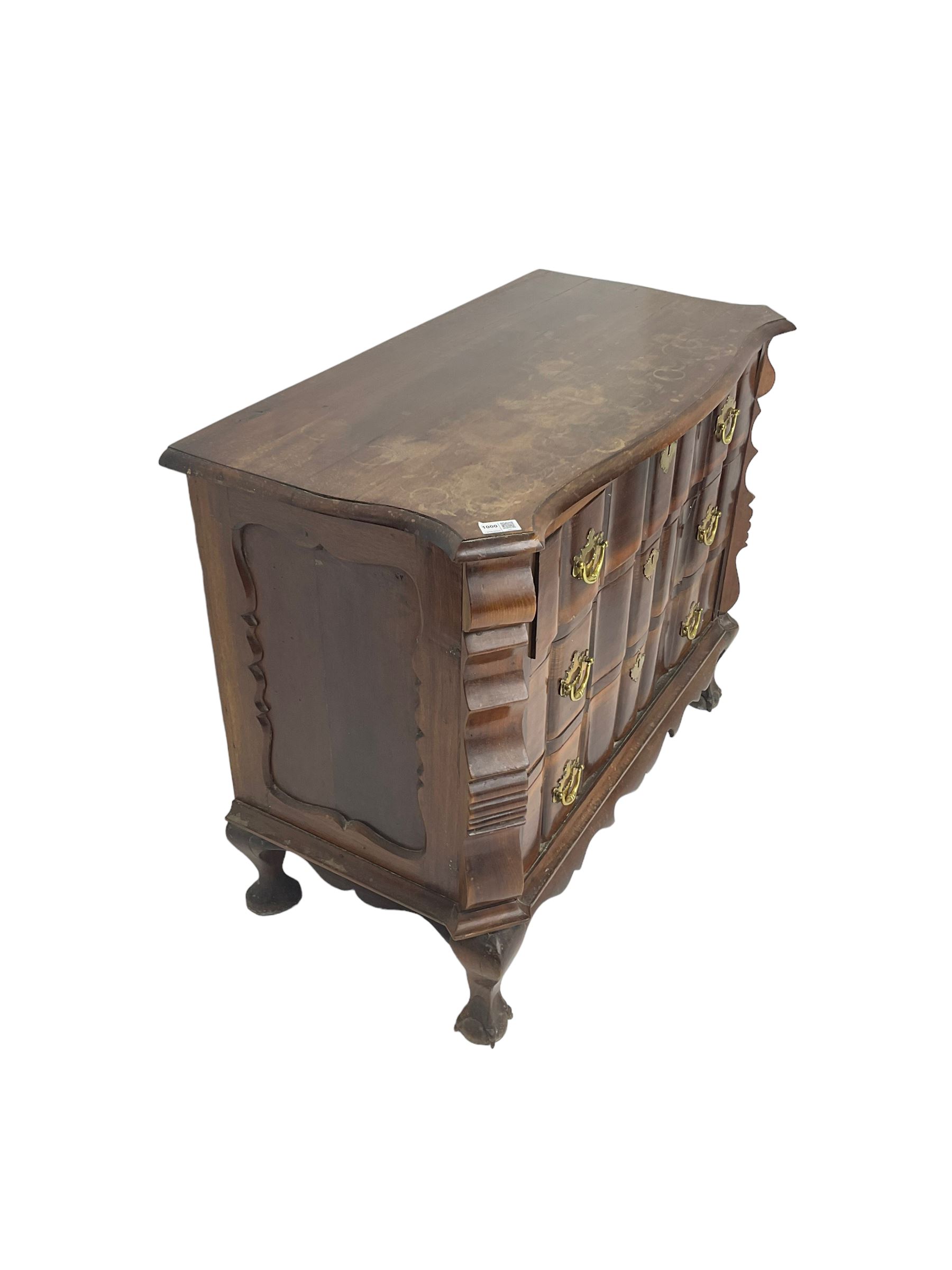19th century Dutch serpentine chest, moulded edge, fitted with three drawers with shaped fronts and brass handle pulls, flanked by shaped uprights and panelled sides, raised on cabriole supports terminating in ball and claw feet
