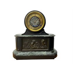 Martin Baskett & Martin - late 19th century Belgium slate and marble 8-day striking mantle clock, movement housed in a drum case on a rectangular plinth with decorative carved volutes and variegated green marble, rectangular bronze panel to the front depicting a child artist at work, circular marble dial with a brass chapter ring engraved in Roman numerals, with a Parisian rack striking  movement striking the hours and half-hours on a bell. With key, no pendulum.