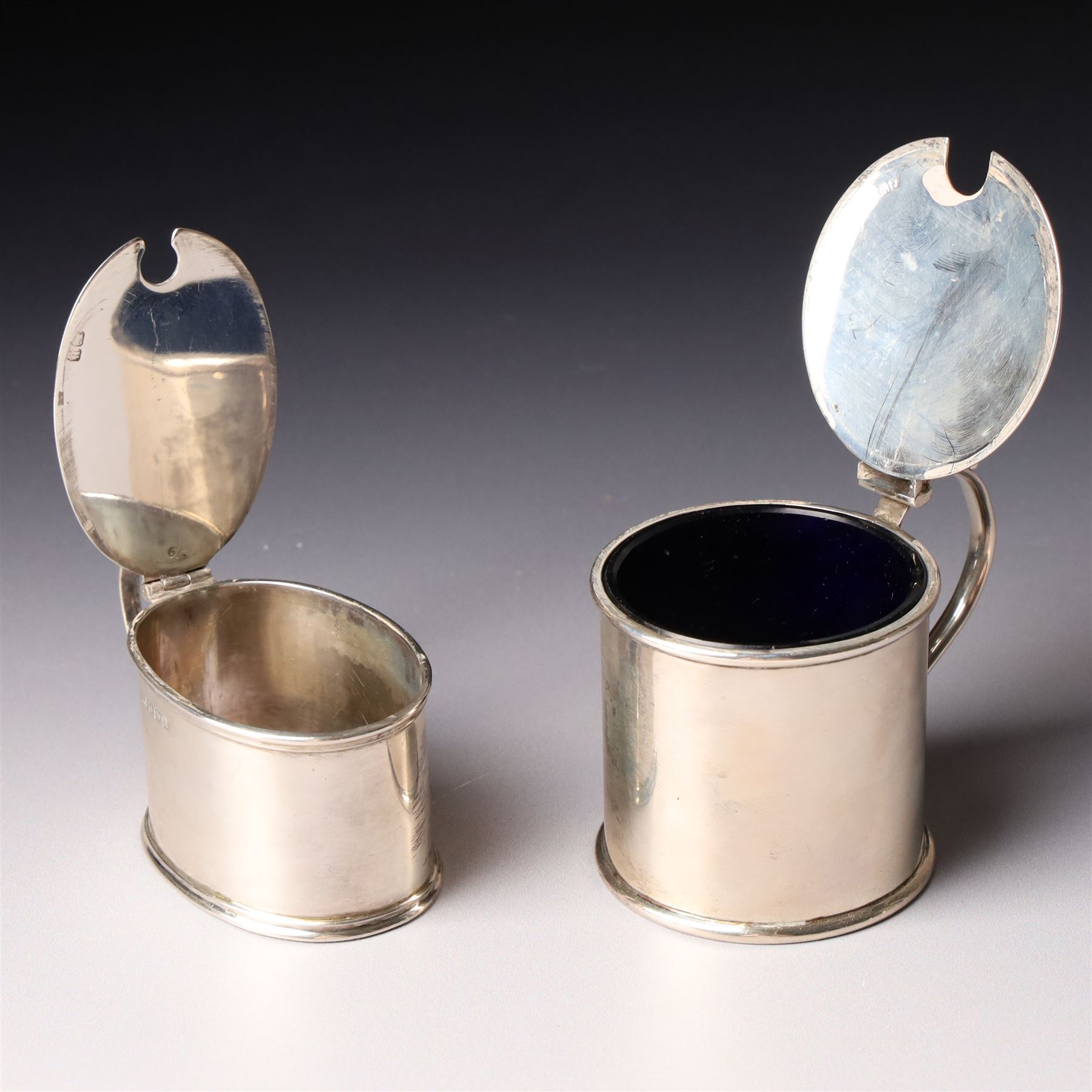 Victorian silver baluster mustard pot with engraved decoration London 1844, pair of silver oval salts and matching mustard  Birmingham 1918 and a circular mustard pot