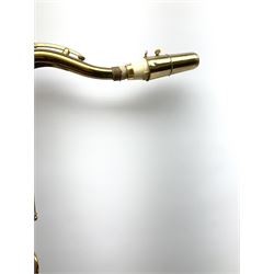 Brass tenor saxophone by Adolphe SAX, 84 Rue Myrha, Paris,  No.938 serial number 12097, H75cm excluding crook; in hard carrying case bearing plaque for Henri Selmer