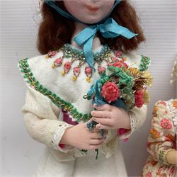 Anna Meszaros Hungary - three hand made needlewrok figurines - each wearing a lon floral dress and bonnet and holding a bouquet of flowers, tallest H32cm (3)  Auctioneer's Note: Anna Meszaros came to England from her native Hungary in 1959 to marry an English businessman she met while demonstrating her art at the 1958 Brussels Exhibition. Shortly before she left for England she was awarded the title of Folk Artist Master by the Hungarian Government. Anna was a gifted painter of mainly portraits and sculptress before starting to make her figurines which are completely hand made and unique, each with a character and expression of its own. The hands, feet and face are sculptured by layering the material and pulling the features into place with needle and thread. She died in Hull in 1998.