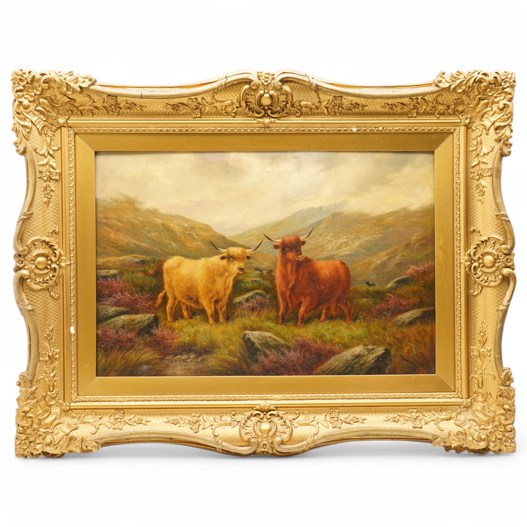 J Henry (British Late 19th century): Highland Cattle, oil on canvas signed 39cm x 60cm housed in Victorian ornate gilt swept frame overall 68cm x 88cm