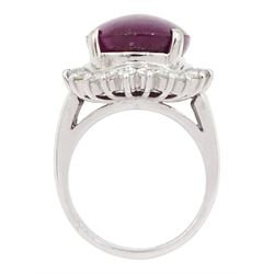Platinum cabochon star ruby and round brilliant cut diamond cluster ring, stamped Pt900, ruby 12.57 carat, total diamond weight 0.88 carat