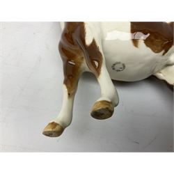 Two Beswick Pinto Ponies piebald and skewbald, no. 1373, both with impressed marks beneath 