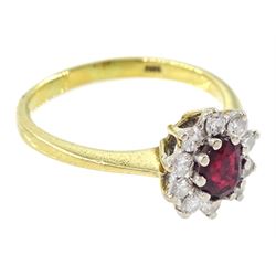 18ct gold oval cut ruby and round brilliant cut diamond cluster ring, London 1976, ruby approx 0.45 carat, total diamond weight approx 0.30 carat