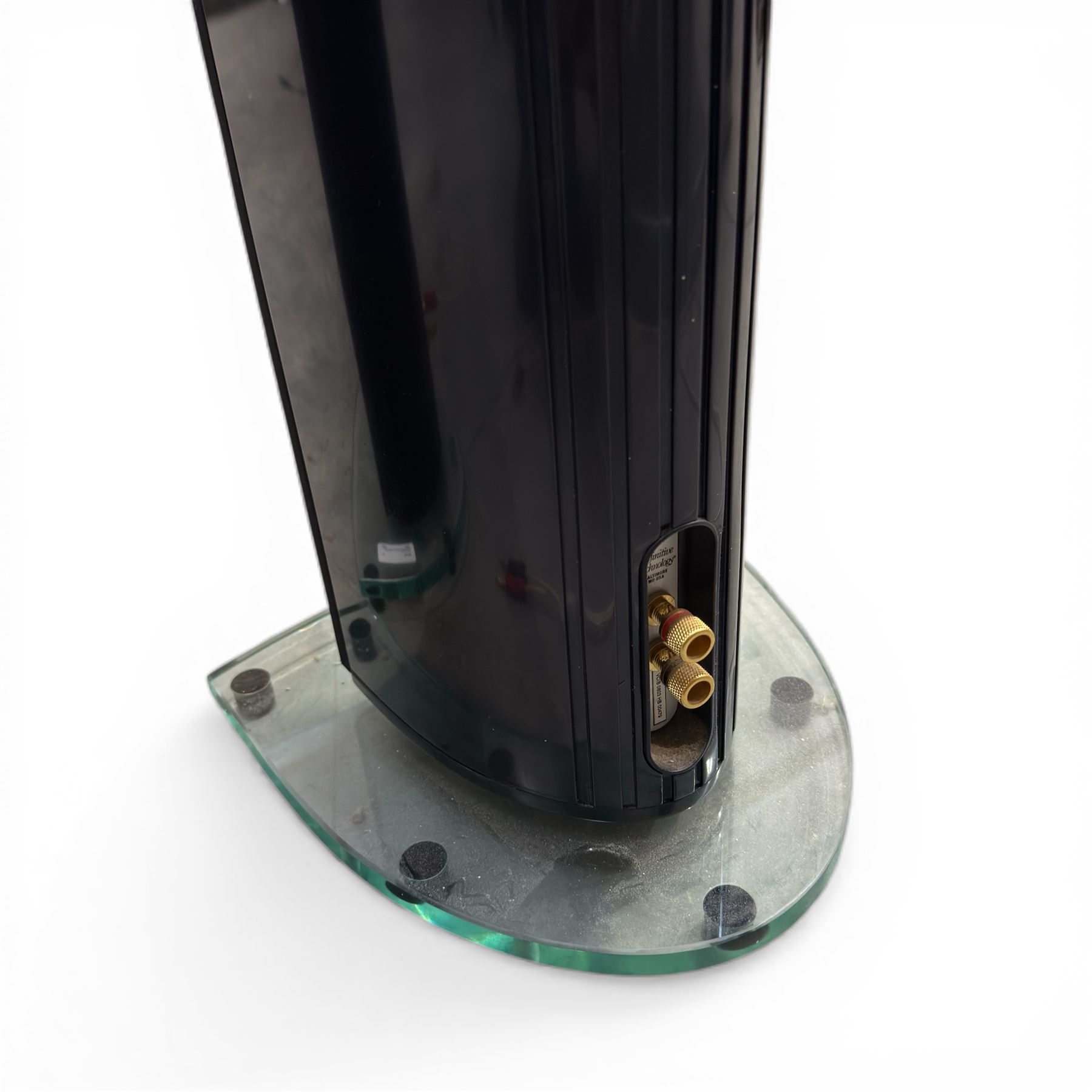 pair of 'Definitive' speakers on glass stands, speakers H120cm