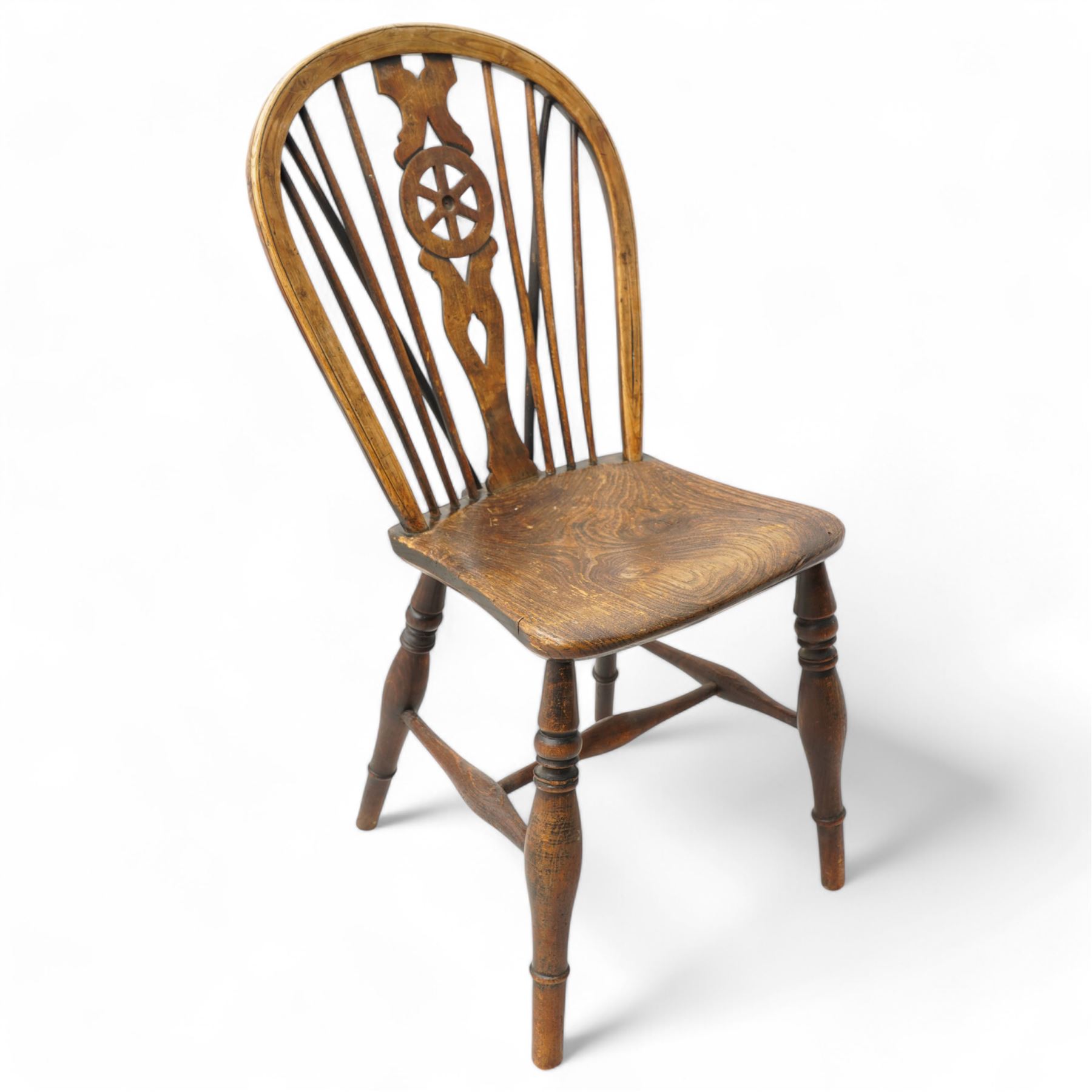 19th century elm and beech hoop and stick back Windsor chair, dished seat on turned supports united by H-stretchers, the seat stamped 'T.H. Filmer C&M 1859' (W38cm, H86cm);19th century elm and beech Windsor chair, hoop and stick back with pierced wheel splat, dished seat on turned supports united by swell turned stretchers (W36cm, H88cm)