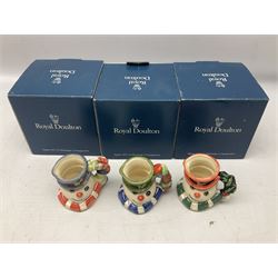 Three Royal Doulton The Mickey Mouse Collection figurines comprising Mickey Mouse MM1, Minnie Mouse MM2, and Goofy MM5, together withe three Royal Doulton limited edition miniature snowman character jugs comprising Christmas Stocking Snowman D7124, Christmas Cracker Snowman D7158 and Snowman D7062, all with original boxes 