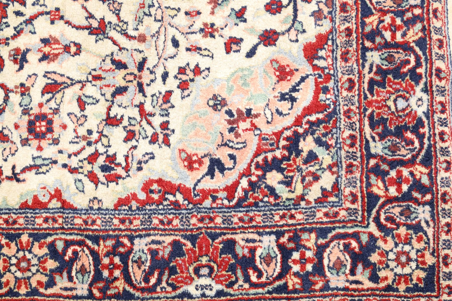 Two Persian rugs, Persian Hamadan hand-knotted rug, ivory ground centred by a terracotta medallion, surrounded by scrolling floral and foliate motifs, dark navy floral border with narrow guard stripes, fringed ends, H 176cm, W 75cm, Persian tribal hand-knotted rug, madder red ground decorated with three large geometric medallions, surrounded by angular motifs, enclosed by multiple geometric borders in dark navy, ivory and red, fringed ends, H 150cm, W 91cm