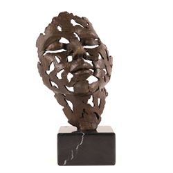 Bronze abstract sculpture of a pierced face, upon a squared marble base, H27cm