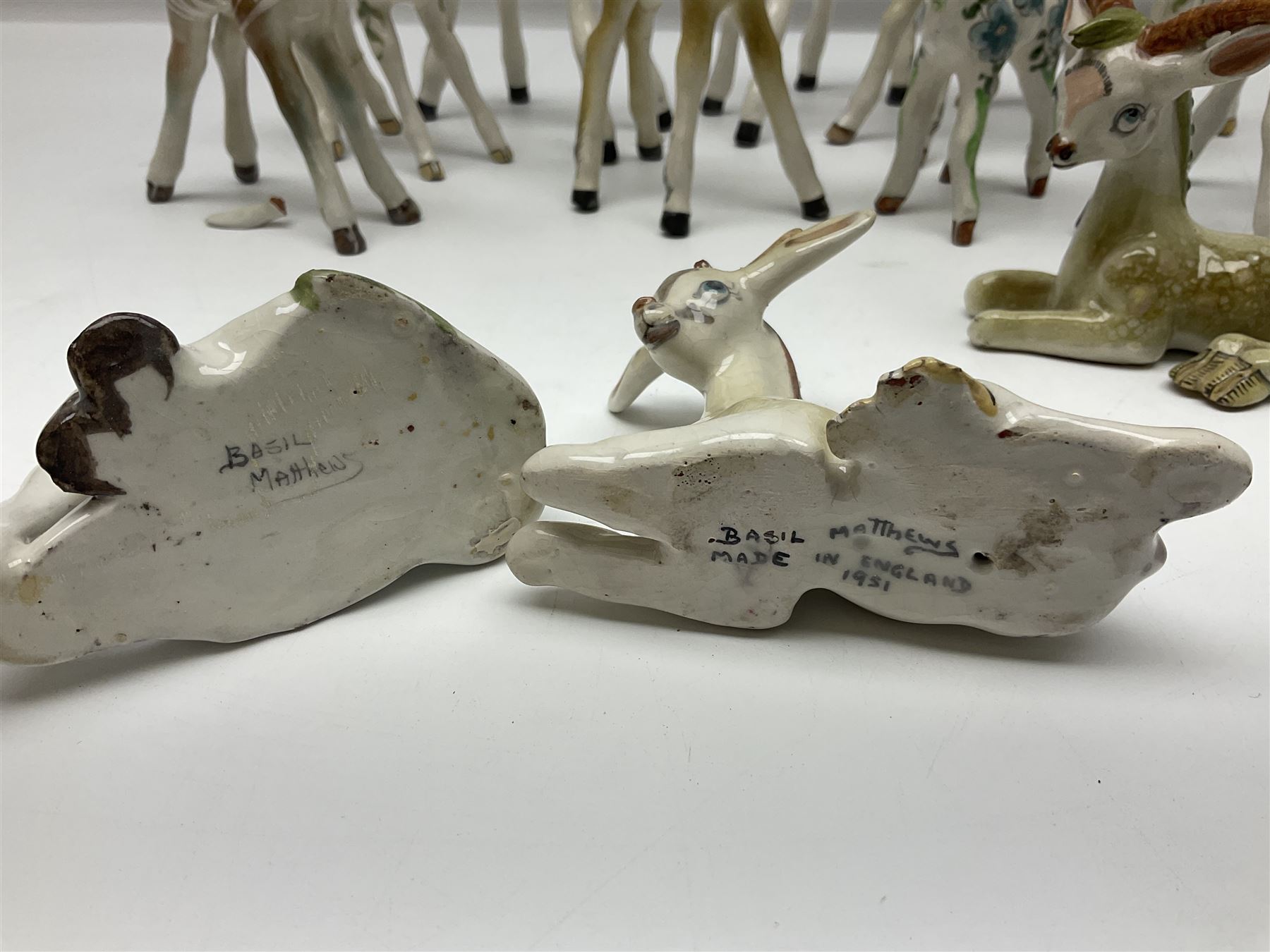 Basil Matthews figures, comprising horses, deer and fawns, all with painted mark beneath, largest H14cm