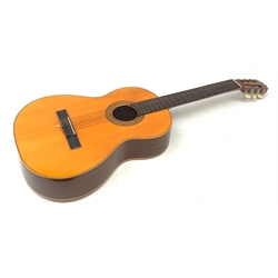 Segovia Spain acoustic guitar with sapele mahogany back and sides and spruce top, bears label, L98cm.