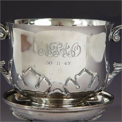 Early 20th century silver porringer, decorated in relief with foliate decoration and later engraving to body, upon a stepped circular foot, with matching cover/stand, both hallmarked Johnson, Walker & Tolhurst, London 1913, H8cm