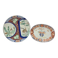 Two 19th century Japanese Imari pattern oval charger together with another circular Imari charger, circular charger D31cm 