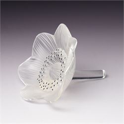 Lalique Lions Head glass ashtray and an 'Anemone' flower, both marked Lalique, France and boxed (2)