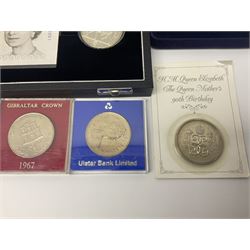 The Royal Mint United Kingdom 'Millennium' silver proof two coin set comprising 1999 and 2000 five pound coins, 2000 'The Queen Mother Centenary Year' silver proof crown, 2001silver proof one pound, 'Her Majesty The Queen Golden Jubilee 1952-2002' silver proof 2002 five pound coin and ten pound banknote set, all being cased with certificates, United Kingdom 1999 brilliant uncirculated coin collection in card folder, other commemorative coinage etc