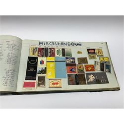 Quantity of vintage matchbox covers housed in old ledger, including Austrian, American and English examples
