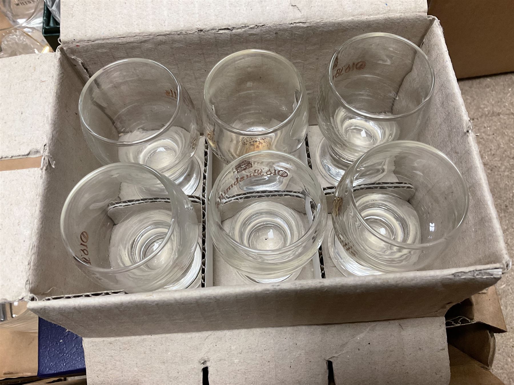 Caithness 'Fireball' paperweight, together with four cased Tyrone Crystal glasses, glass oil lamp, three glass decanters etc, in two boxes